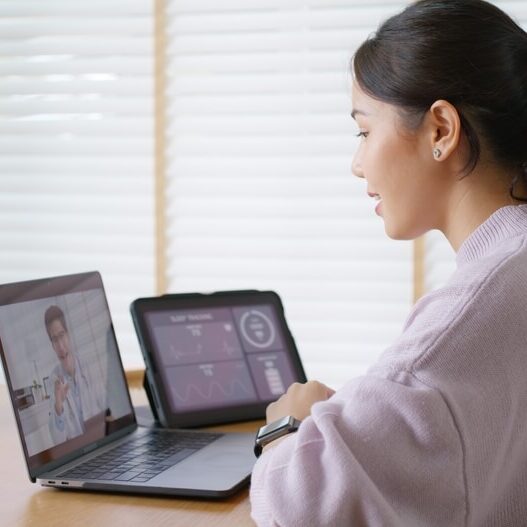 woman meeting with doctor via telehealth for iv drip services (1)